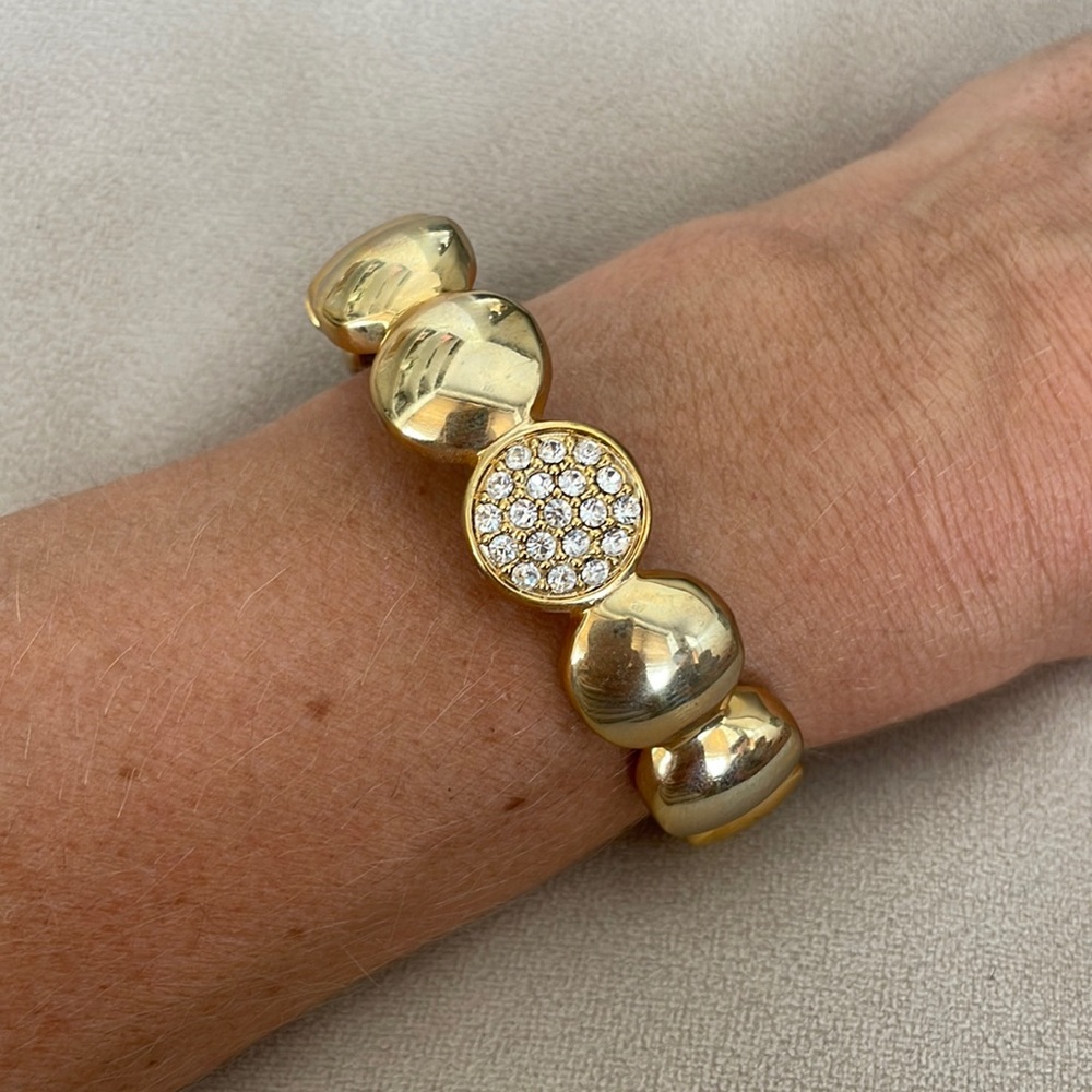 Gold tone and rhinestone fashion bangle
